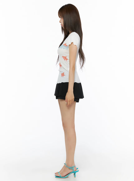 Lettering Wavy Slim T-Shirt IL515 White full-body side shot on model standing profile view wearing black mini skirt and teal heels slim fit silhouette