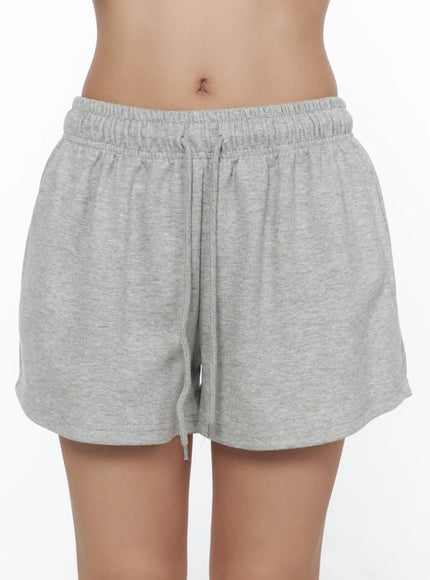 Lightweight Sweat Shorts CL513 Gray close-up front shot on model showing elastic waistband drawstring tie and relaxed fit cotton-blend fabric