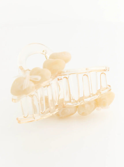 Lily heart Hair Clip IL503 cream front angled view highlighting clear acrylic teeth and ivory heart bead embellishments along top and bottom edges