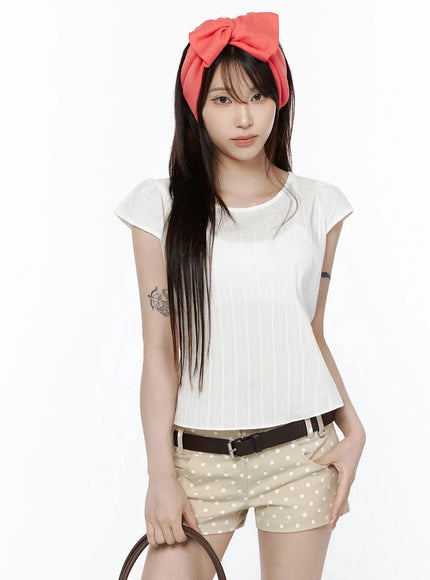 LEWKIN Linen Summer Blouse IL506 White front model shot size S/M with vertical stripe texture, cap sleeves, styled with polka dot shorts and red bow headband