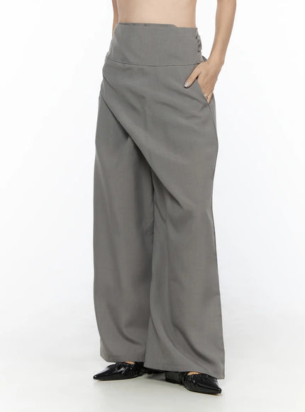 LEWKIN Linen Wrap Slacks CL527 Beige S/M side view on model showing wrap front drape high waistband and wide-leg silhouette with black pointed flats