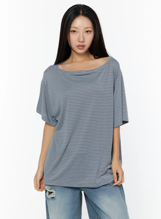 Loose Fit Striped Top CU526 Beige front shot on model standing straight showing wide boat neckline and relaxed striped knit fabric