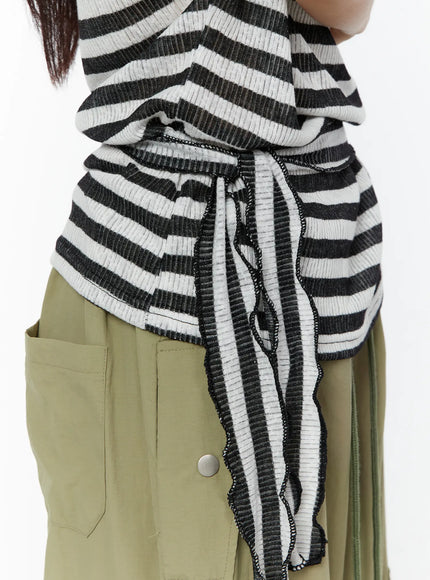 Loose Off-Shoulder Top CU526 Black close-up detail shot of side drawstring tie and ribbed knit stripe fabric texture at waist hem