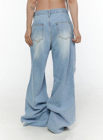 Lou Distressed Wide Leg Jeans CL508 Light blue back view on model showing rear pockets stitching faded wash and wide flared hem