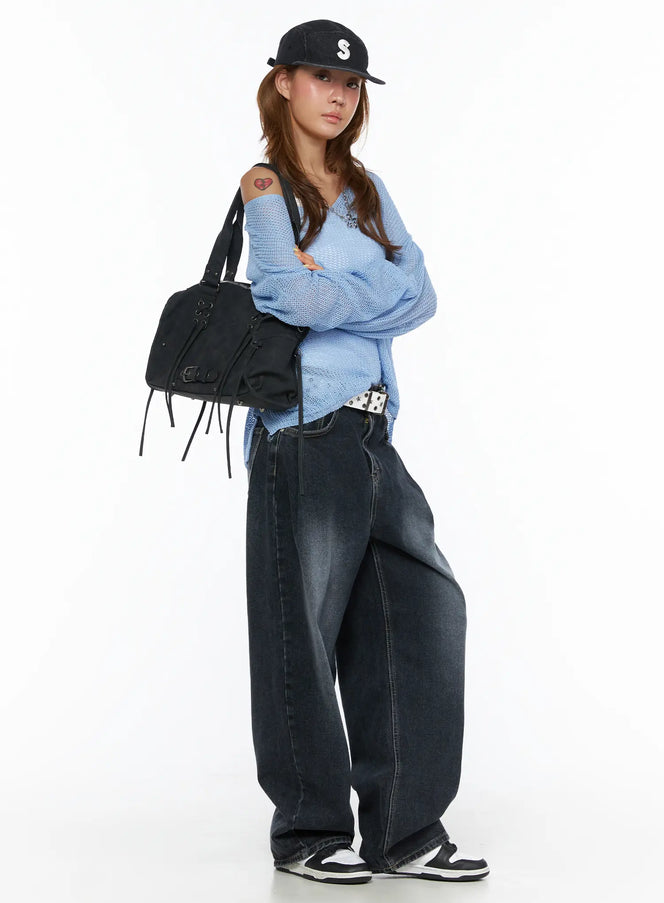 Louis Pintuck Washed Jeans CL503 Dark blue full-body side angle on model styled with blue knit sweater, black cap, and tote bag, wide-leg washed denim