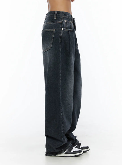 Louis Pintuck Washed Jeans CL503 Dark blue side view on model showing back pocket detail, pintuck pleat, wide-leg shape, and side seam stitching