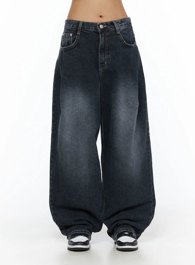 LEWKIN Louis Pintuck Washed Jeans CL503 Dark blue front view on model, low-rise waistband with button closure, wide-leg silhouette, faded wash denim, size S