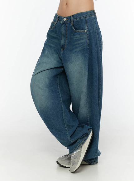 Lovi Washed Wide Leg Jeans CU526 Blue side view on model, showing exaggerated balloon-style wide leg silhouette and faded wash denim texture with sneakers