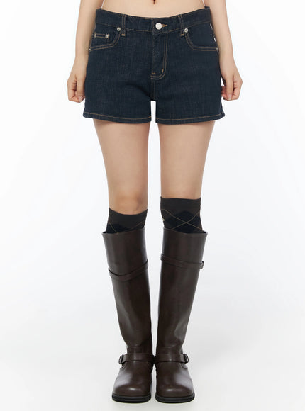 LEWKIN Low-Rise No-Fade Denim Shorts IU525 Dark blue front crop shot on model wearing knee-high boots, gold contrast stitching, silver button