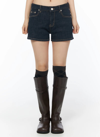 LEWKIN Low-Rise No-Fade Denim Shorts IU525 Dark blue front crop shot on model wearing knee-high boots, gold contrast stitching, silver button