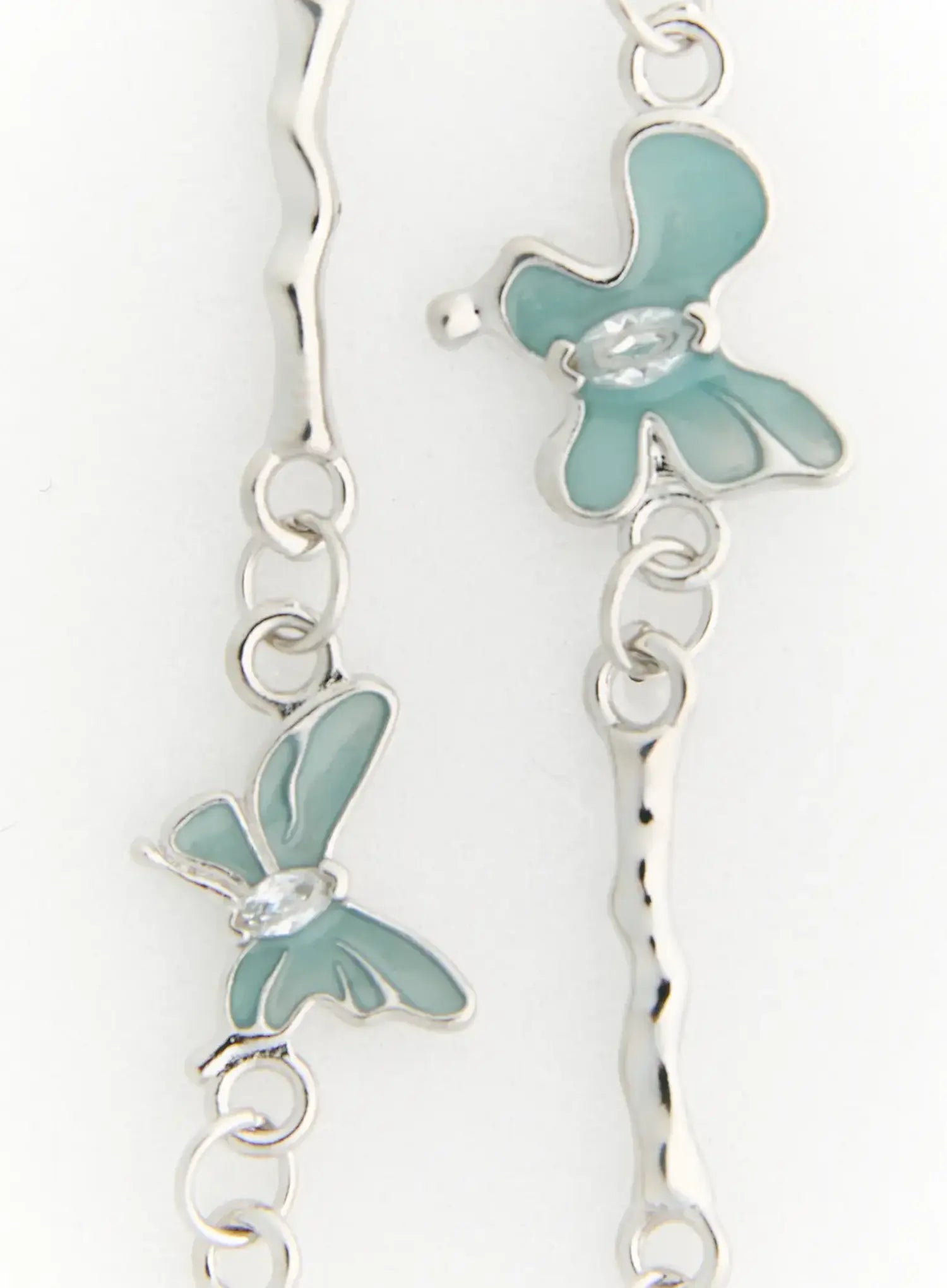 Luna Butterfly Style Necklace IL517 mint blue close-up detail showing multiple enamel butterfly charms and hammered bar links on silver chain