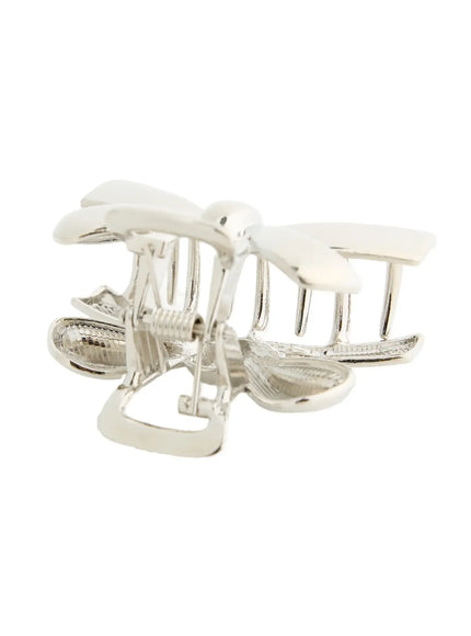 Luna Ribbon Hair Clip IL503 Silver bottom-up detail view revealing spring hinge, grip teeth, and inner claw mechanism of metallic hair clip