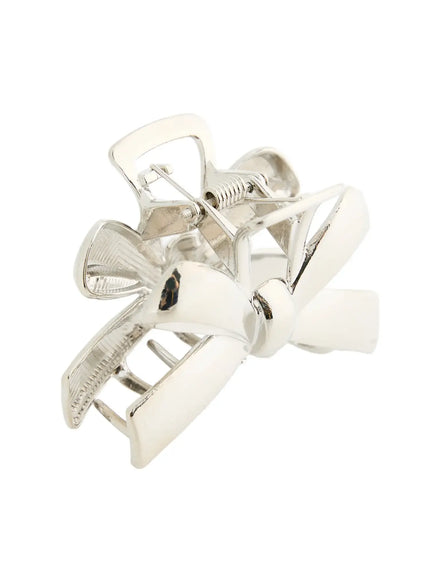 LEWKIN Luna Ribbon Hair Clip IL503 Silver side-angle view showing spring hinge mechanism and open claw teeth of polished metallic bow clip