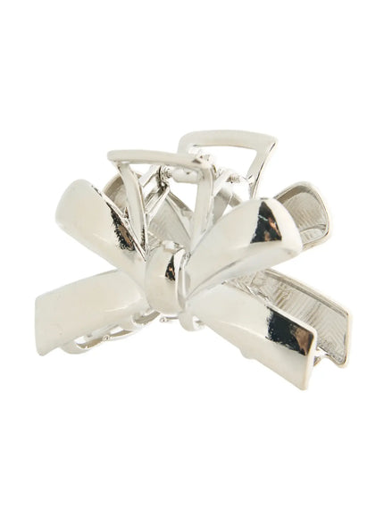 Luna Ribbon Hair Clip IL503 Silver side close-up highlighting layered ribbon petals and reflective polished silver surface with spring joint detail