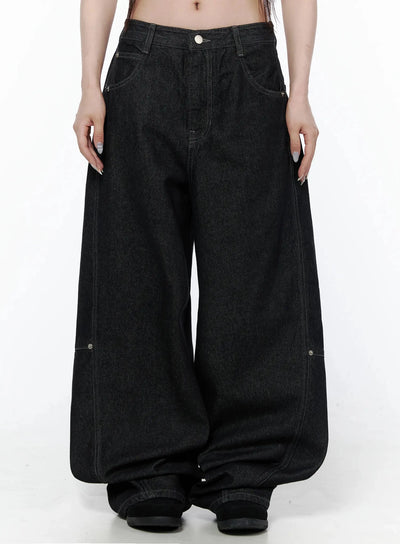 LEWKIN Maelani Rivet Wide Balloon Jeans IL502 Black front view on model showing extreme wide-leg balloon silhouette with contrast stitching and rivet detail, size S