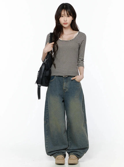 Marion Washed Wide-Leg Jeans IL506 Dark blue full-body front on model styled with striped top and black bag, relaxed balloon-leg silhouette, beige loafers