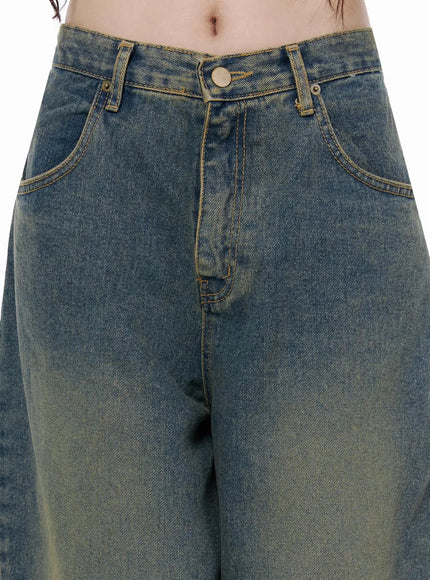 Marion Washed Wide-Leg Jeans IL506 Dark blue close-up detail of high-rise waistband, brass button closure, coin pocket, and yellow contrast stitching on vintage wash denim