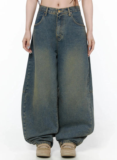 LEWKIN Marion Washed Wide-Leg Jeans IL506 Dark blue front view on model cropped waist shot showing high-rise waist, brass button, front pockets, vintage wash denim