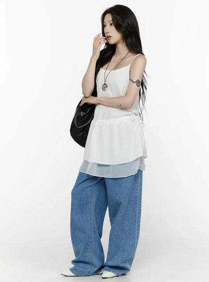 Max Wide Leg Jeans IL521 Blue angled front close-up on model highlighting oversized balloon-style wide leg and low-rise waistband detail