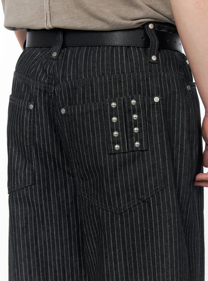 Men's Alexis Striped Wide Leg Jeans IU523 Black close-up detail of back pockets with silver pearl studs arranged in grid pattern on pinstripe denim fabric