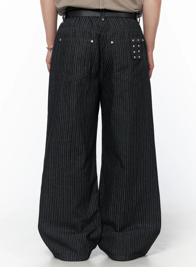 Men's Alexis Striped Wide Leg Jeans IU523 Black back view on model wearing leather belt with silver stud pocket detail and pinstripe denim