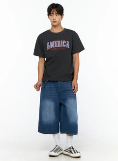 LEWKIN Men's America Print T-Shirt IL515 Dark gray front full-body shot on male model styled with wide-leg denim shorts and checkered slip-ons, size M/L