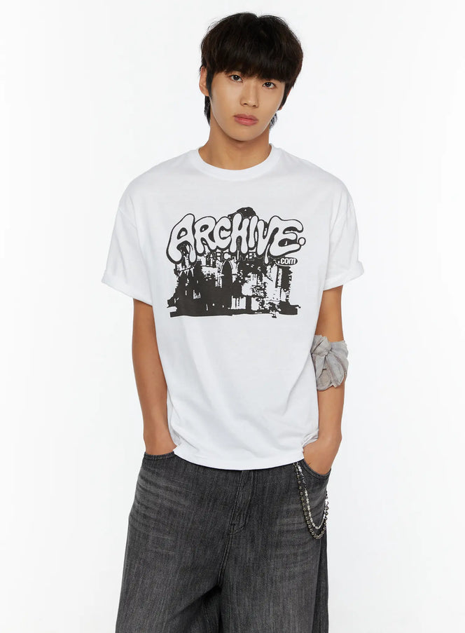 LEWKIN Men's Archive Graphic T-Shirt IL515 White front view on model wearing hands-in-pockets pose styled with dark wide-leg denim and chain accessory
