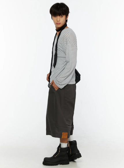 Men's Baggy Cargo Shorts (Dark Gray) IL515 Dark Gray side view on male model styled with striped long-sleeve top, black scarf, and combat boots