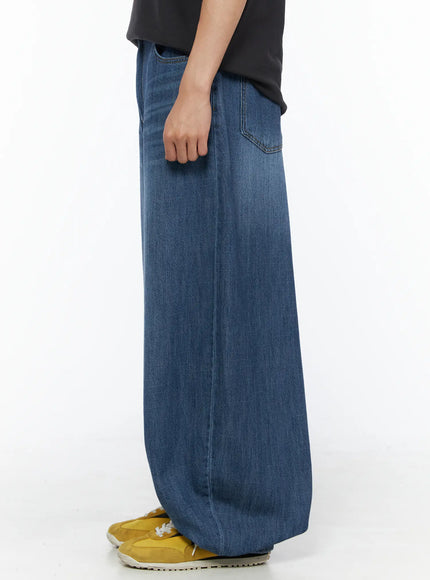 Men's Balloon Fit Linen Jeans (Blue) IL514 Blue side shot on model showing straight silhouette, back pocket detail, and wide leg with yellow sneakers