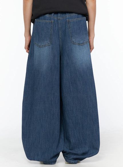 Men's Balloon Fit Linen Jeans (Blue) IL514 Blue back shot on model showing two large patch pockets, balloon hem pooling at ankles, washed denim texture