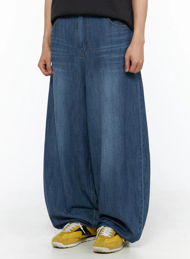 Men's Balloon Fit Linen Jeans (Blue) IL514 Blue mid-length front crop shot on model showing voluminous balloon leg hem pooling at yellow sneakers