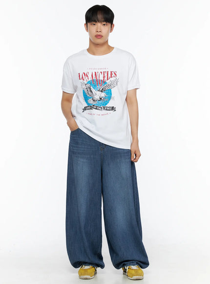 Men's Balloon Fit Linen Jeans (Blue) IL514 Blue full-body front shot on male model standing straight, white Los Angeles graphic tee tucked out, yellow sneakers