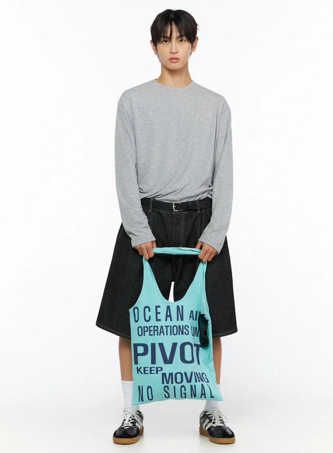 LEWKIN Men's Basic Long Sleeve T-Shirt IL528 Gray front shot on male model holding mint tote bag styled with black denim shorts and sneakers