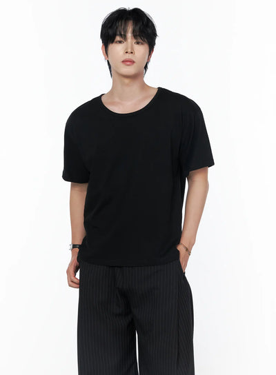 Men's Basic U-Neck T-Shirt IU523 Black front shot on male model standing upright paired with pinstripe wide-leg trousers