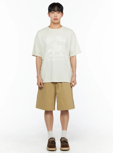 Men's Bermuda Shorts (Beige) IL514 beige full-body front shot on male model standing straight arms at sides styled with light grey tee and brown suede shoes