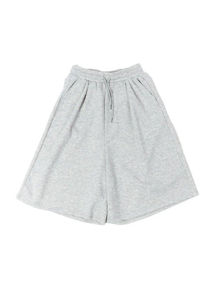 Men's Bermuda Sweat Shorts (Gray) IL514 Gray flat-lay front view showing full silhouette, elastic drawstring waistband, wide-leg cut and heather texture