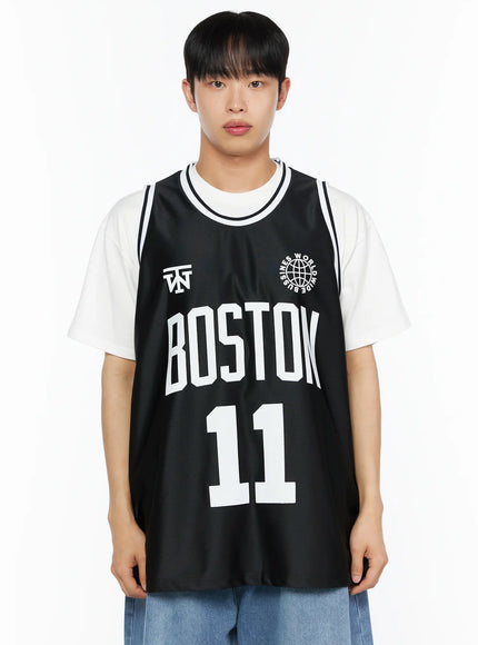 Men's Boston Sleeveless Jersey IL510 Black close-up front shot on male model showing BOSTON 11 white print globe logo and white stripe neckline detail