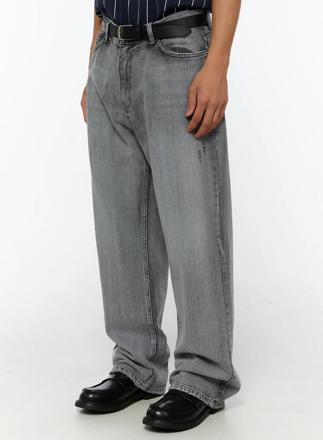 Men's Bryce Distressed Wide-Leg Jeans IL509 Light gray side-angle close-up on model showing wide leg, distressed detail, and back pocket