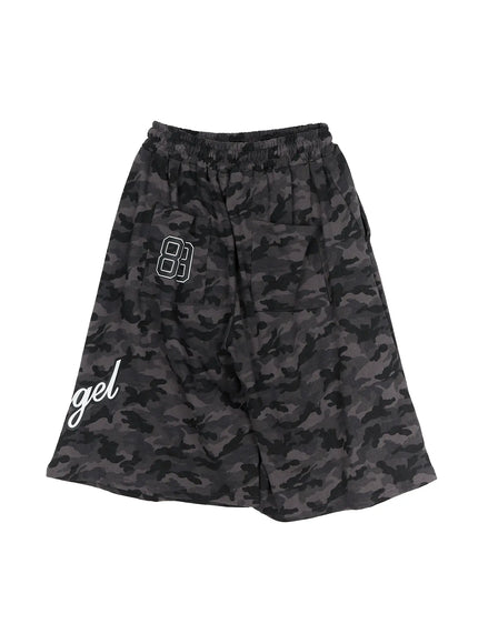 Men's Camo Graphic Shorts (Dark Gray) IL509 Dark gray flat-lay back view showing elastic waistband, 89 numeral on pocket, and gel script graphic on lower left hem
