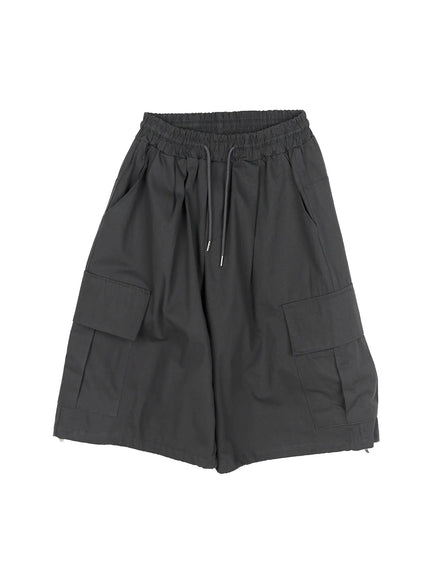 Men's Cargo Jorts IL510 Dark gray flat-lay back showing full CHANGE RULE bold white graphic print across two rear pockets side cargo pockets elastic waist