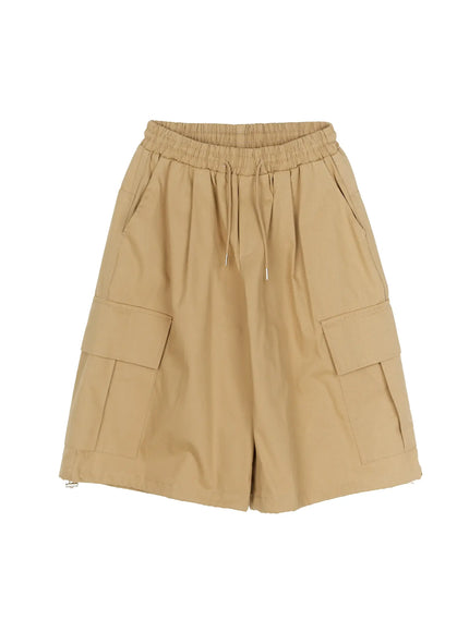 Men's Cargo Street Jorts IL510 khaki flat-lay front view showing elastic drawstring waistband dual cargo pockets wide-leg cut and side zipper hem detail