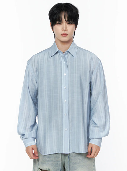Men's Casual Button-Up Shirt IL502 Light blue front full view on model showing fully buttoned placket, tonal stripe pattern, relaxed boxy fit, and balloon-style long sleeves