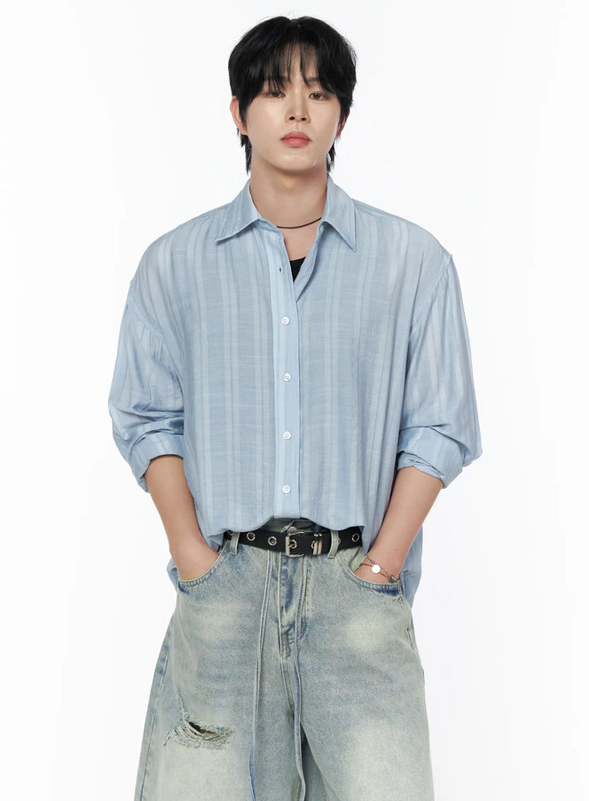 LEWKIN Men's Casual Button-Up Shirt IL502 Light blue front view on model size M/L with tonal stripe texture, worn open over black tank with distressed jeans