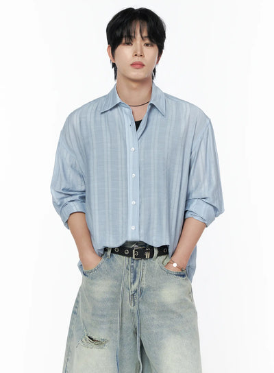 LEWKIN Men's Casual Button-Up Shirt IL502 Light blue front view on model size M/L with tonal stripe texture, worn open over black tank with distressed jeans