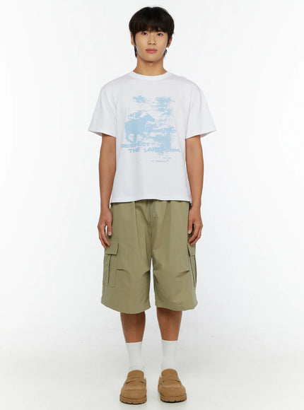 Men's Casual Graphic Print T-Shirt IL513 White full-length front shot on male model standing straight with arms at sides paired with olive cargo shorts and loafers