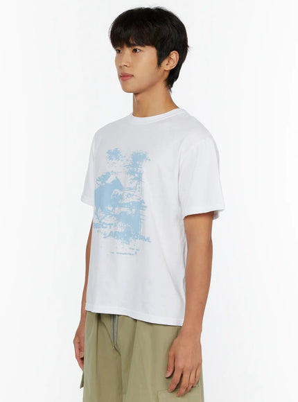 Men's Casual Graphic Print T-Shirt IL513 White side shot on male model showing blue graphic print detail, crew neckline, and short sleeve construction with slight drape