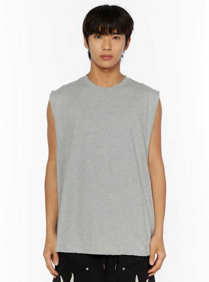 Men's Casual Sleeveless Top IL510 Gray front shot on male model showing distressed raw hem detail and heathered cotton texture against black shorts