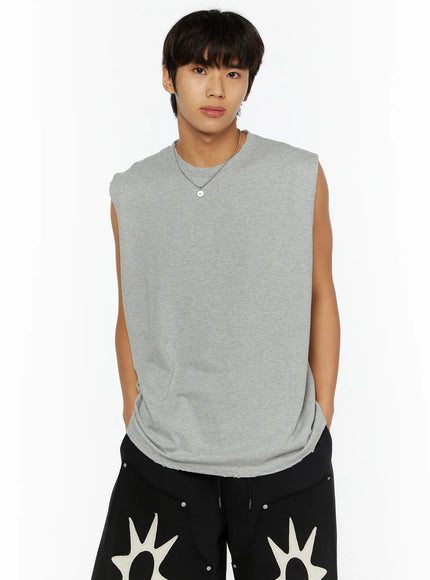 Men's Casual Sleeveless Top IL510 Gray close-up front shot on male model wearing chain necklace, showing raw-edge neckline and heathered cotton texture