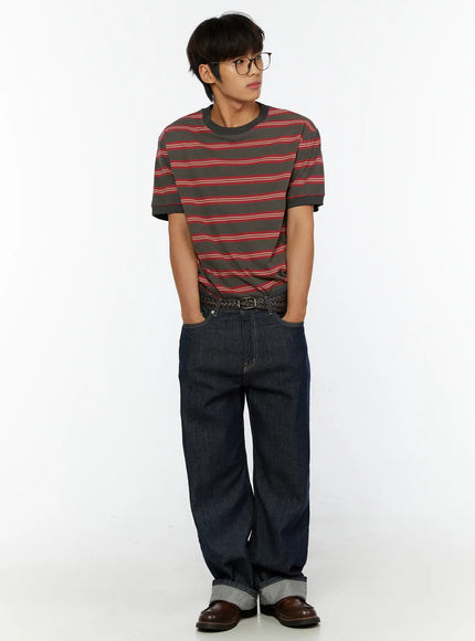 Men's Casual Striped T-Shirt IL515 Red full-body front shot on model hands in pockets gazing sideways wearing glasses with wide-leg denim