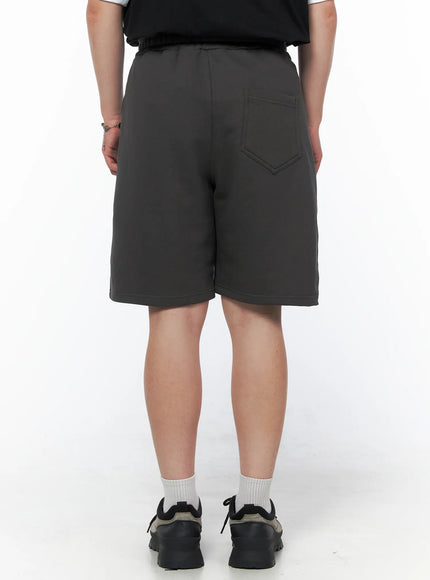 Men's Casual Sweat Shorts (Dark Gray) IL502 Dark Gray back view on model showing single back patch pocket with topstitching and elastic waistband